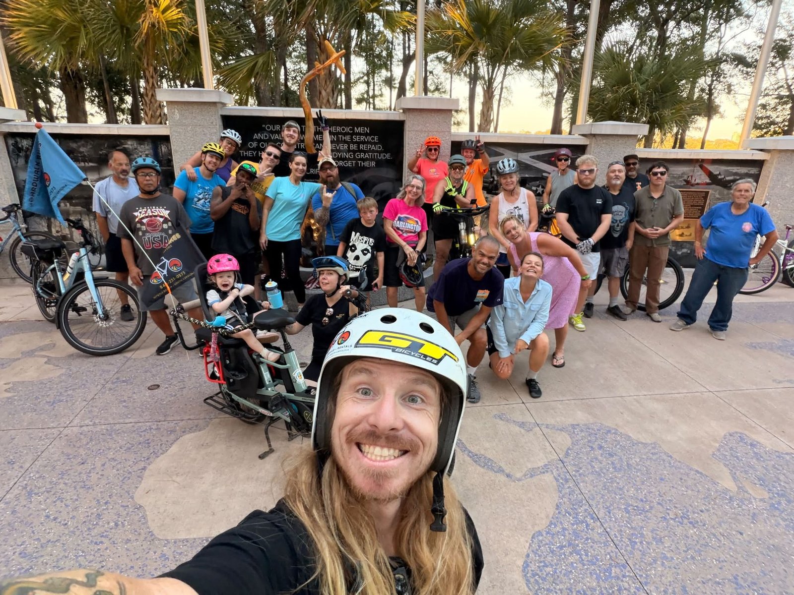 A Boardwalk Bikes Wednesday group ride — riders and their bikes gathered for a photo before rolling out